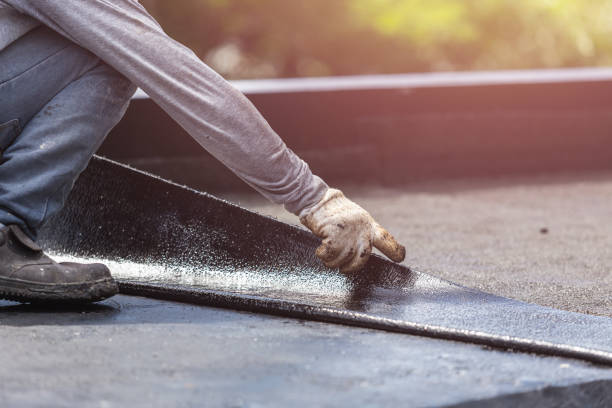 Professional Exterior Waterproofing technician working in Hatley, WI